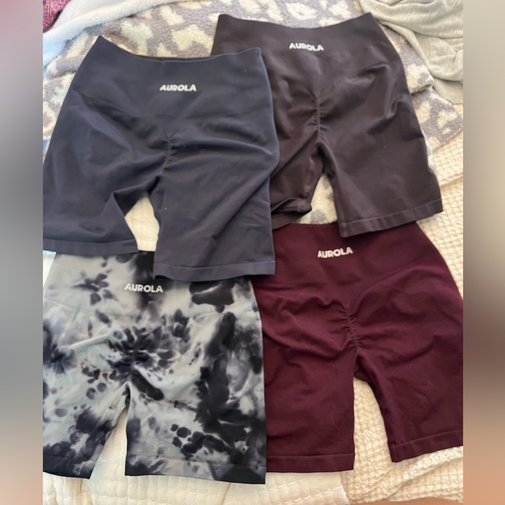 Bundle of (4) aurola shorts size small.